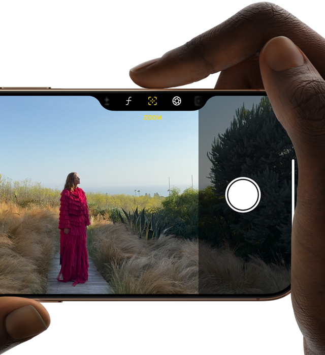 Ovládání fotoaparátu na iPhonu 16 Pro, prst vpravo posouváním po straně telefonu upravuje hloubku ostrosti